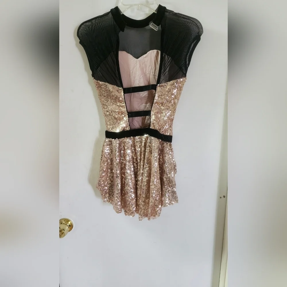 Revolution,dance custum, spandex, and stretch black velvet and lush sequence